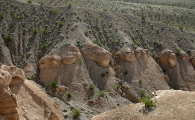 Hard cap rocks resist erosion